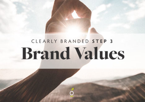 holding out a hand up to the sun, where it looks like you are capturing the sun between your fingers. Headline over it: Clearly Branded Step 3 Brand Values